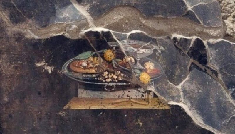 In un affresco di Pompei una pietanza che sembra pizza